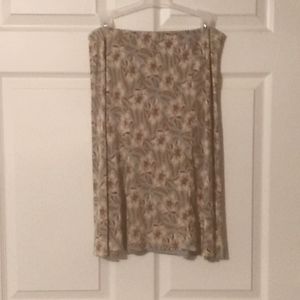 Skirt floral print. Teal red pink tan colors. Size 6.